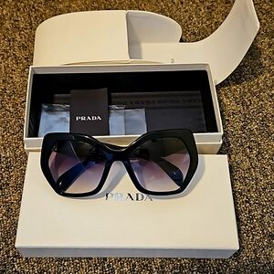 Prada sunglasses used once